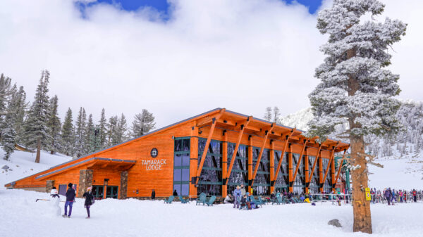 Skiers gather outside the snow-covered Tamarack Lodge at Heavenly Mountain Resort, Nevada.