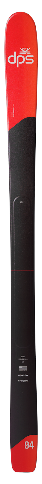 DPS Carbon Pisteworks 94 ski shown vertically in red and black