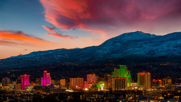 Reno, Nevada skyline at sunset with Mount Rose in the background.