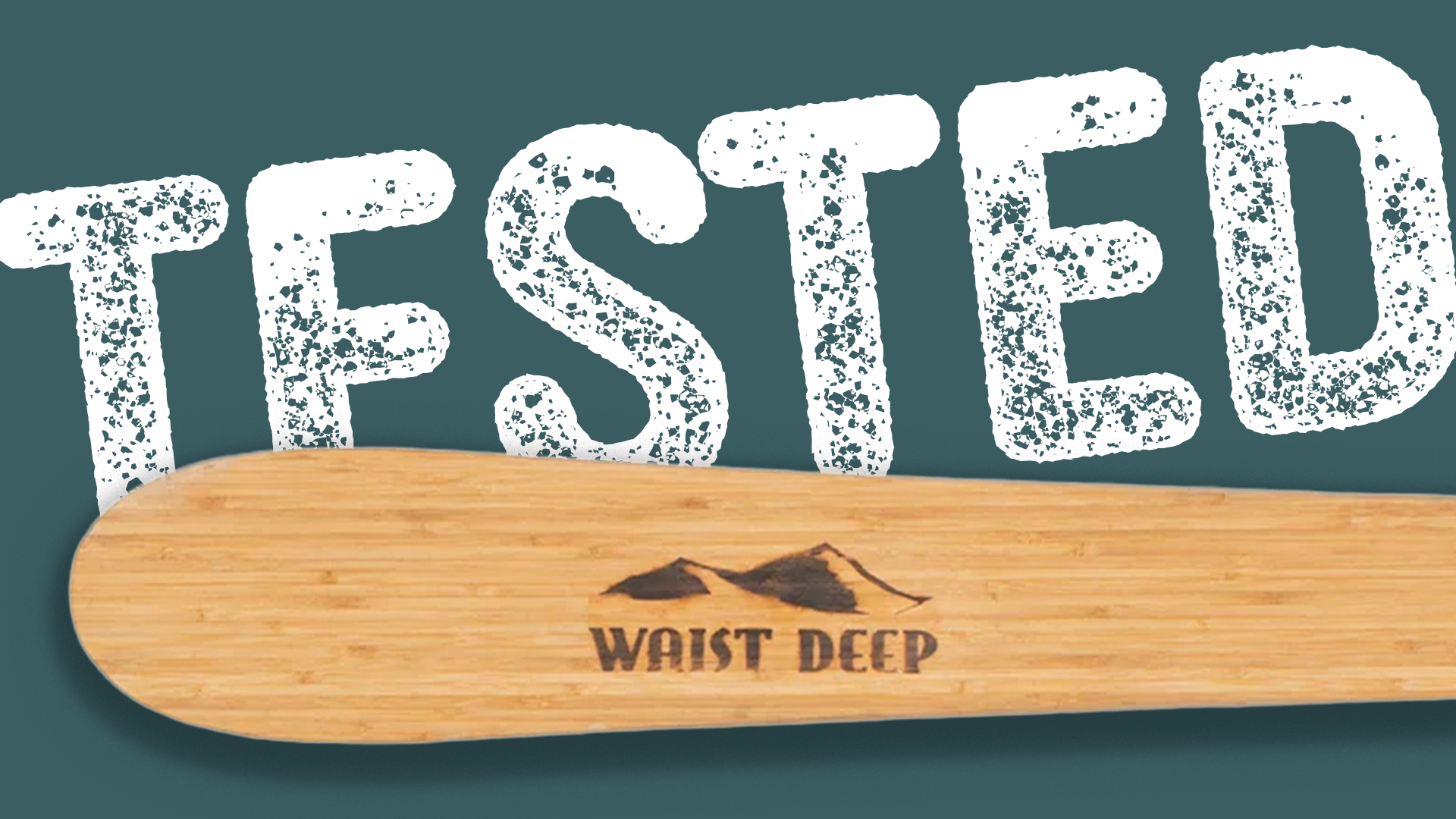 Waist Deep ski tip close-up with Tested badge overlay